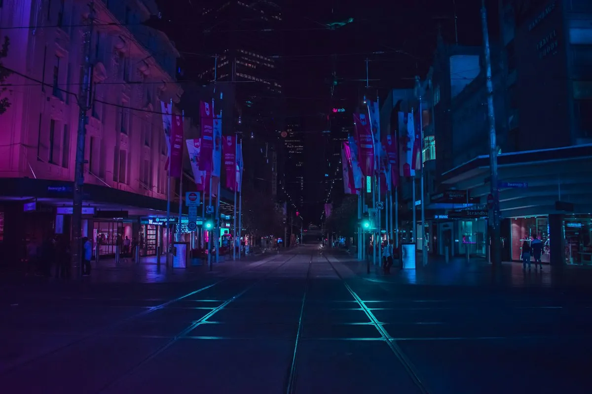 A city street illuminated at night